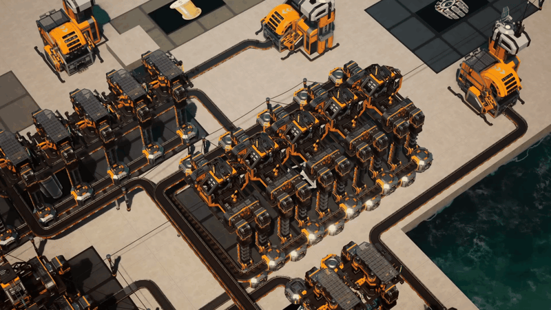 Overhead view of a Satisfactory production section with conveyor belts and splitters running exposed between machine rows