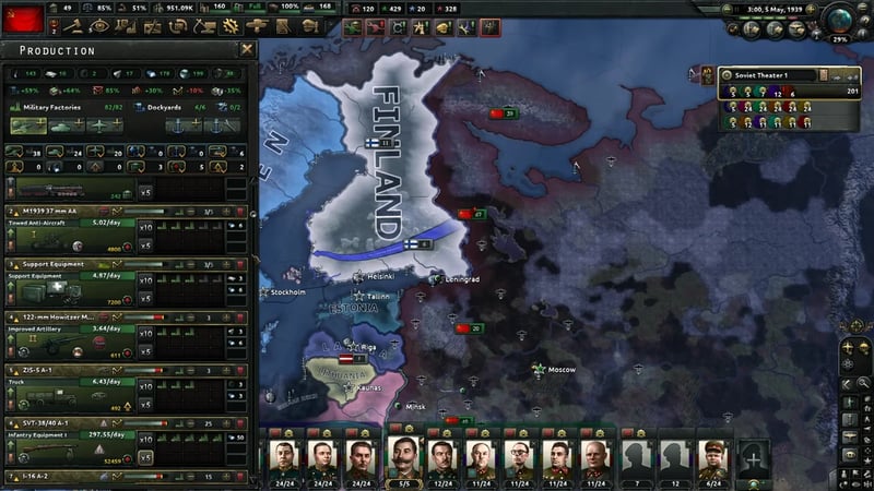 Production tab over the Finnish front showing multiple queued production lines with their daily output rates and remaining IC costs, alongside 82 of 82 military factories in use