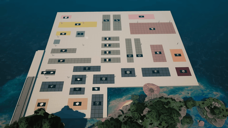 Satisfactory foundation grid blocked out with colour-coded pads and signs marking each production section