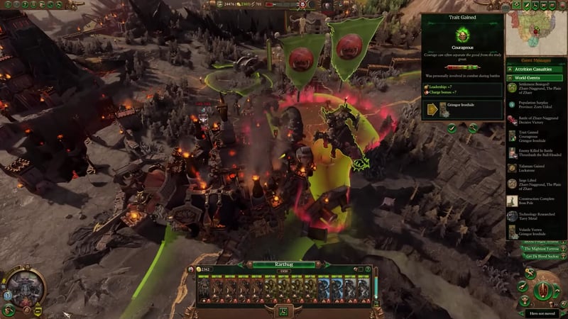 Campaign map view of a Chaos Dwarf capital city with a full garrison and two player armies nearby, garrison units arrayed along the bottom, and hero scouting visible.
