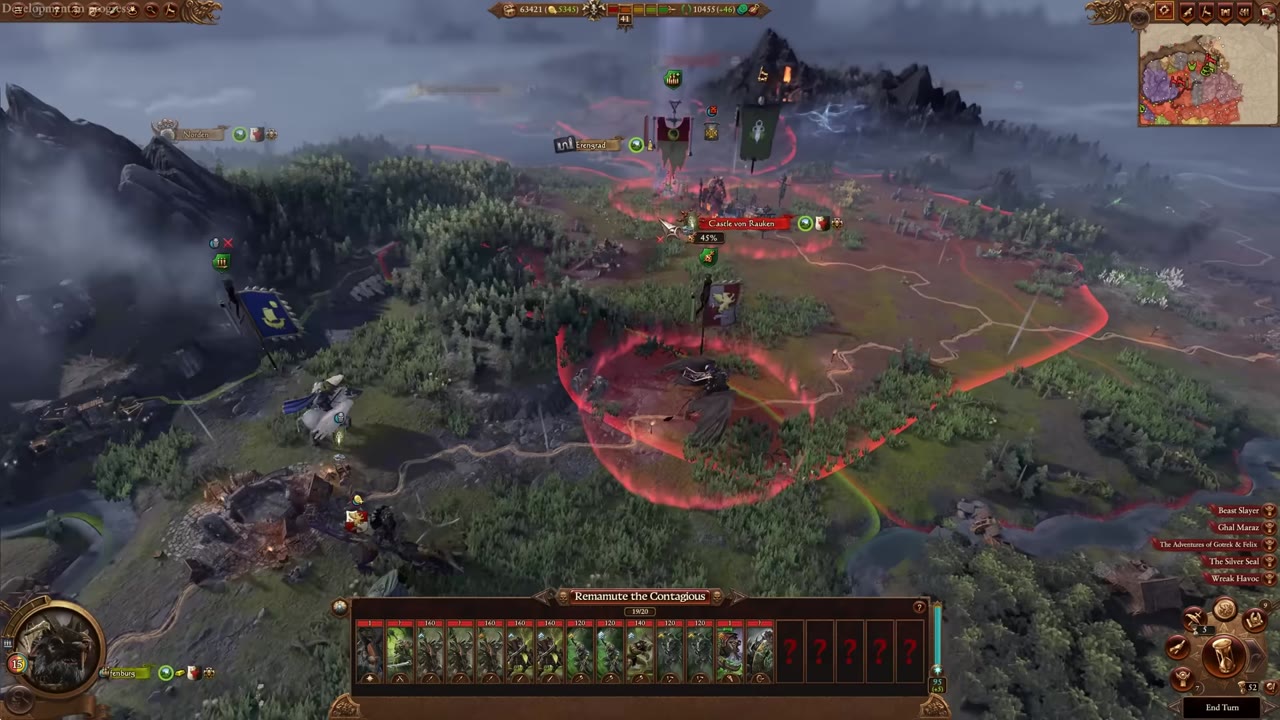 Campaign map with enemy army selected and a red movement range ring around it; player's army is positioned at the edge of the enemy's range near a settlement.