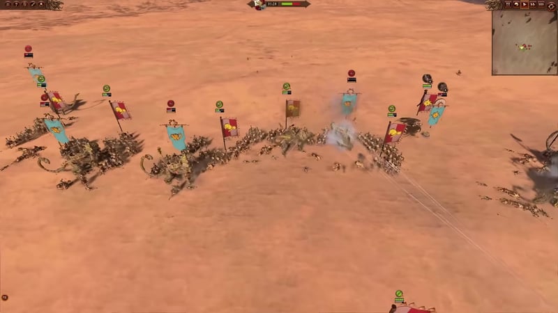 Battle screen showing a line of anti-large units and handgunners in formation fighting multiple large monster units, flags and unit health bars are visible on a desert map.