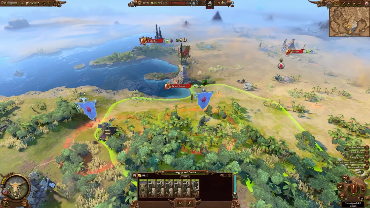 Campaign map showing a small bait force (Larguz Ash'naur) in force march, with the main hidden army in ambush stance inside a red circle, near enemy settlements and armies.