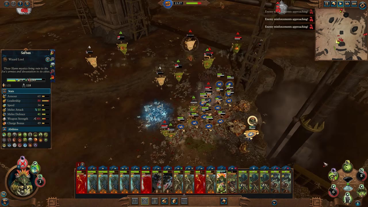 Battle screen with a Life Slann Wizard Lord selected and an army group of multiple Stegadons and Scar-Veterans, health and unit cards visible at the bottom.