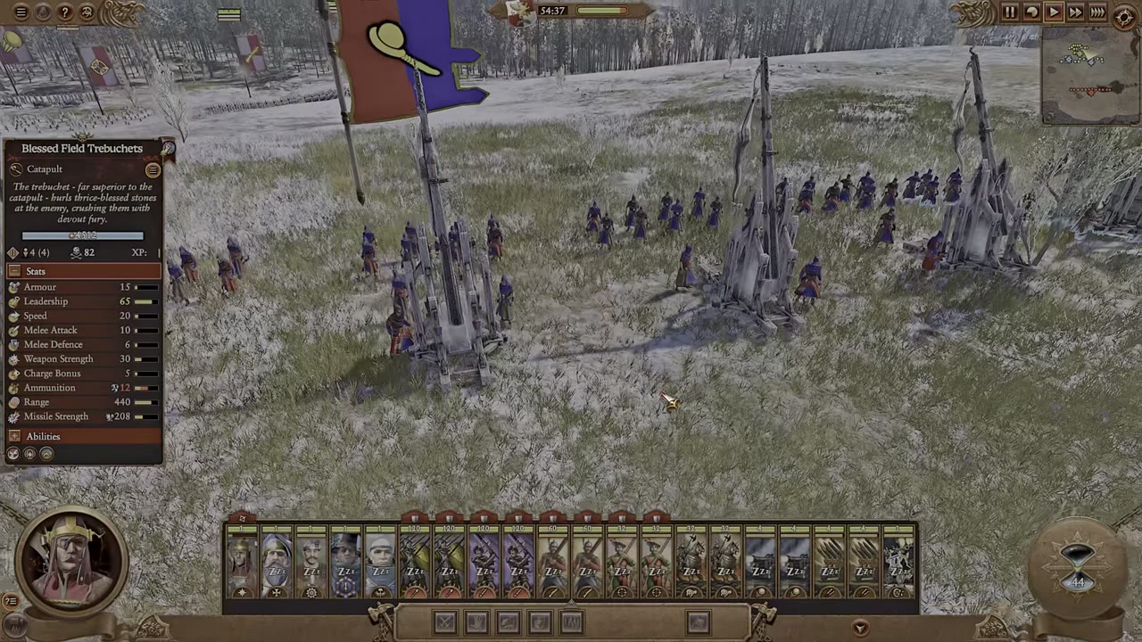 Blessed field trebuchets selected on the battlefield, with unit stats for armor, leadership, speed, melee attack, missile strength, and abilities visible in the left panel.