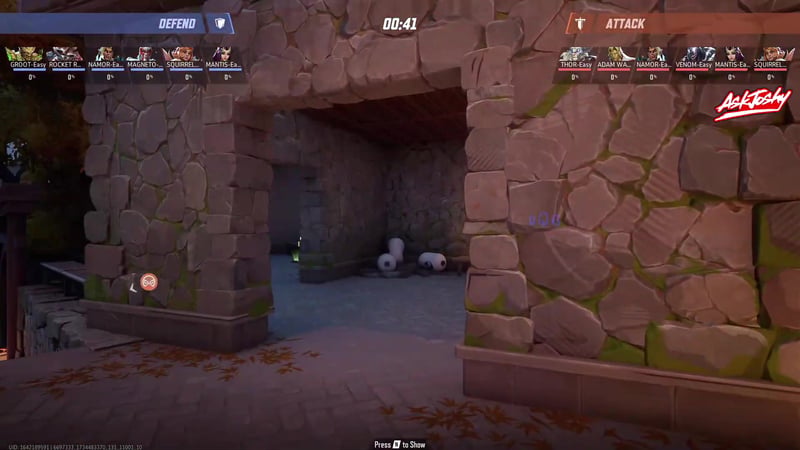 A stone archway leading into a room with a health pack visible on the floor near supply crates