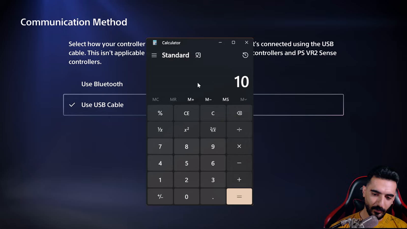 Calculator overlay confirming the millisecond math behind the measured controller latency difference