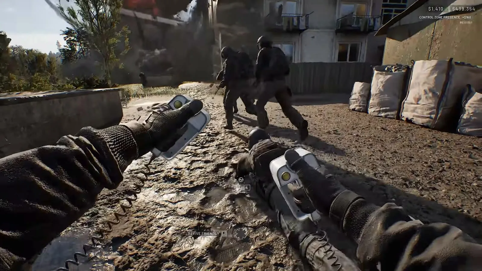 WARDOGS first-person view of a player reaching to revive a downed teammate