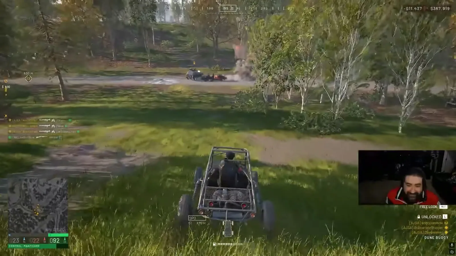 WARDOGS dune buggy driving through a forest clearing