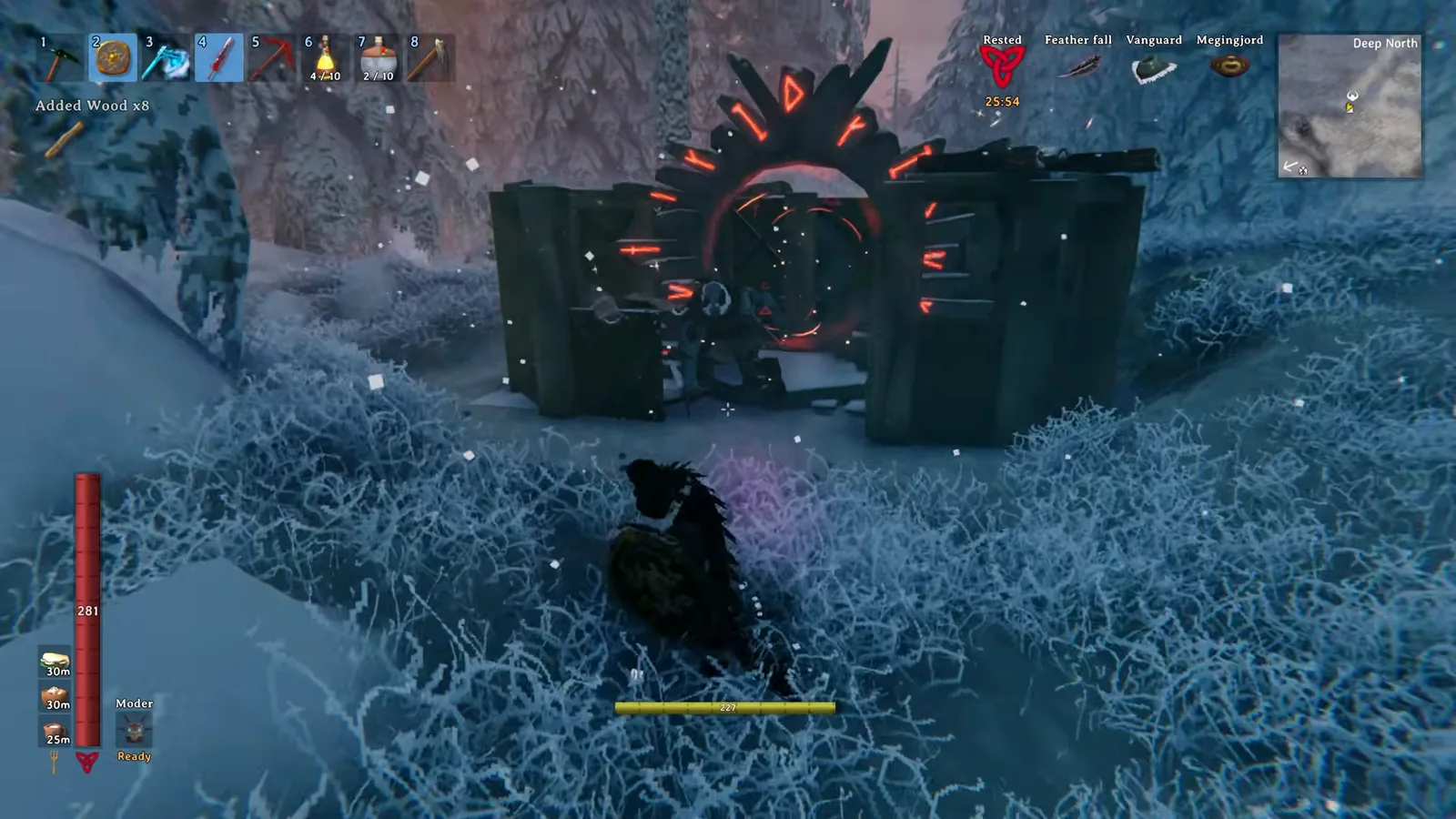 The Aesir Passage gateway with glowing red runes in the Valheim Deep North snow, the Kall Fimbulbringer arena entrance