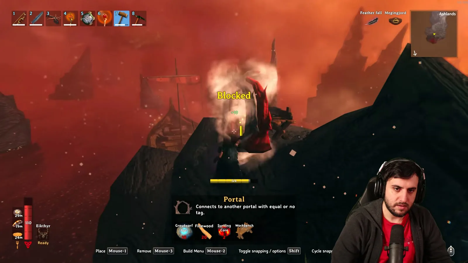 Placing a portal on a beach rock at the Ashlands landing in Valheim