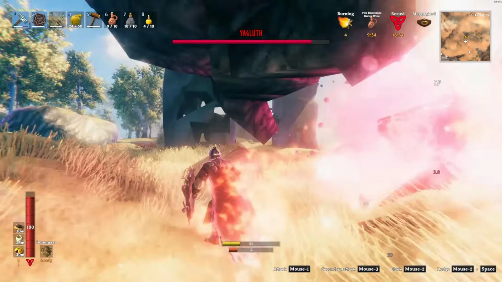 Player burning under Yagluth's attack with the Fire resistance barley wine buff active in the status bar