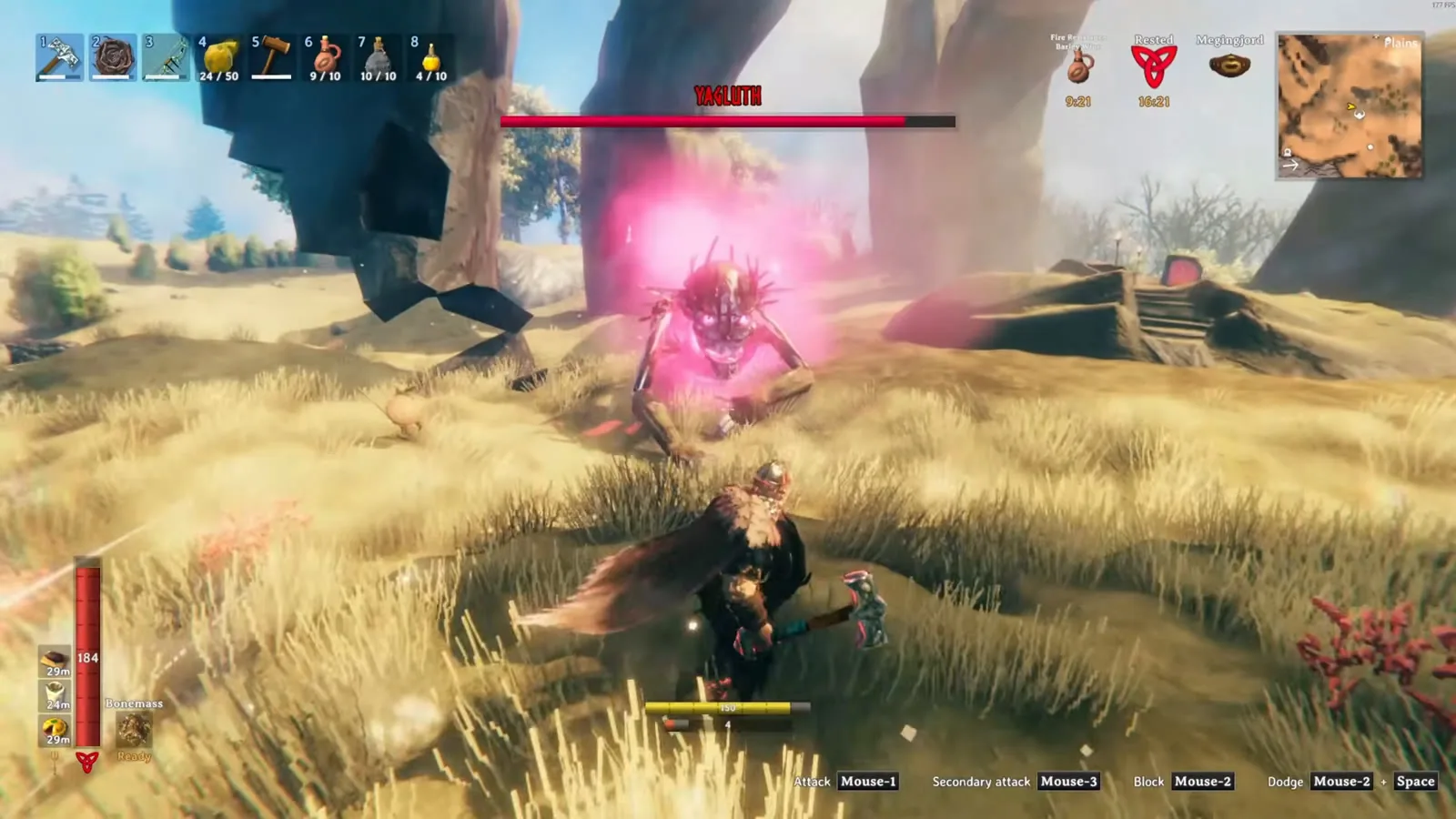 Yagluth glowing pink as he advances on a player holding the Frostner mace in Valheim 1.0