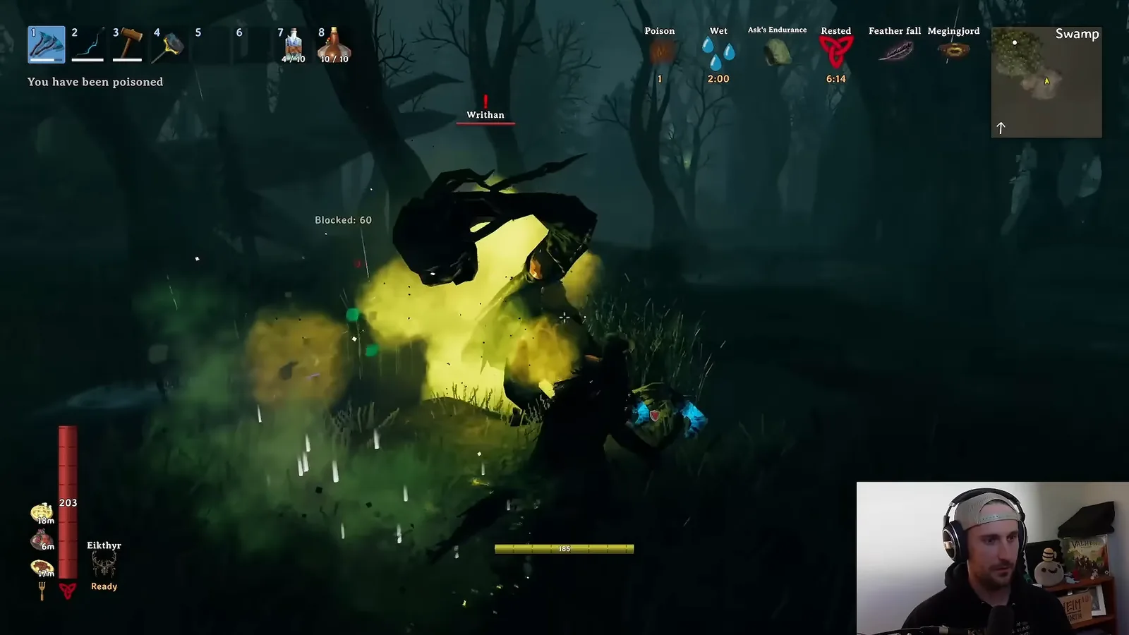 A Writhan, the new Valheim 1.0 Swamp creature, poisoning the player in the Swamp