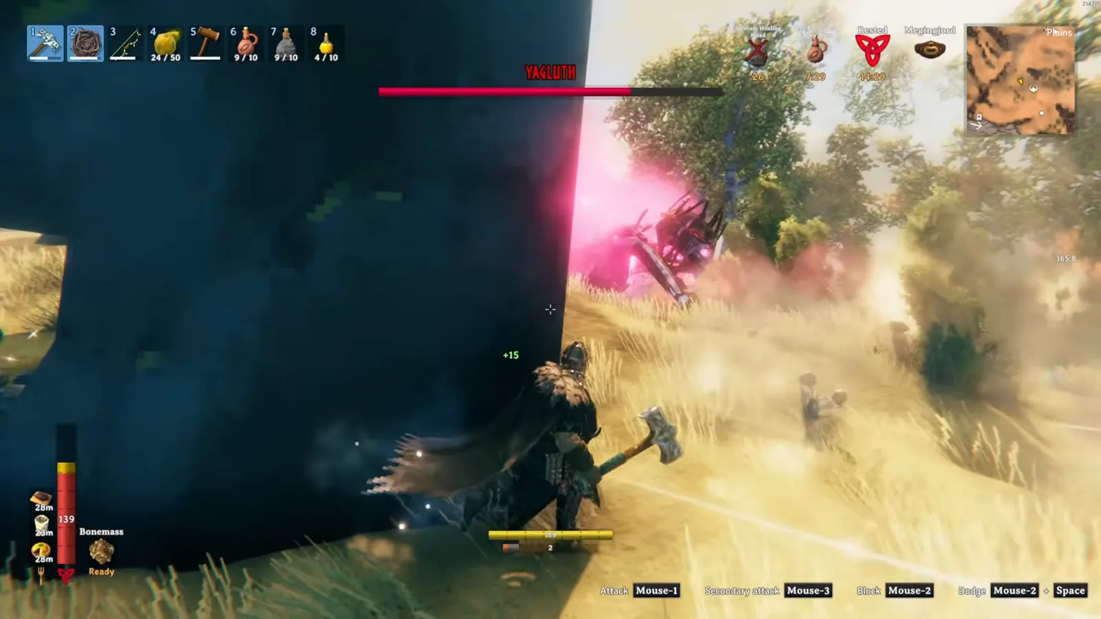 Player healing behind a stone pillar while Yagluth waits on the other side