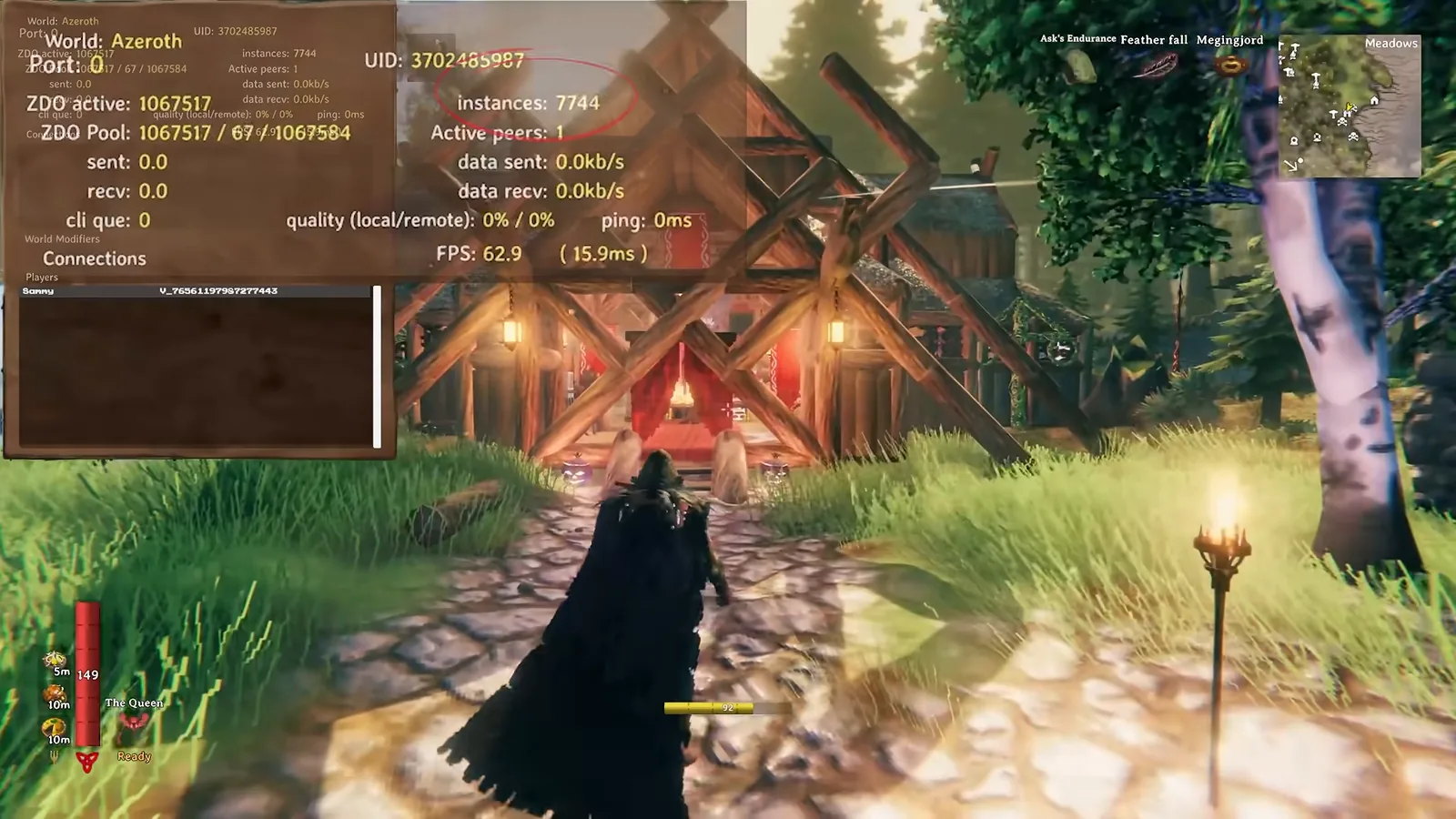 Valheim F2 debug panel showing about 7,700 instances at a large longhouse base