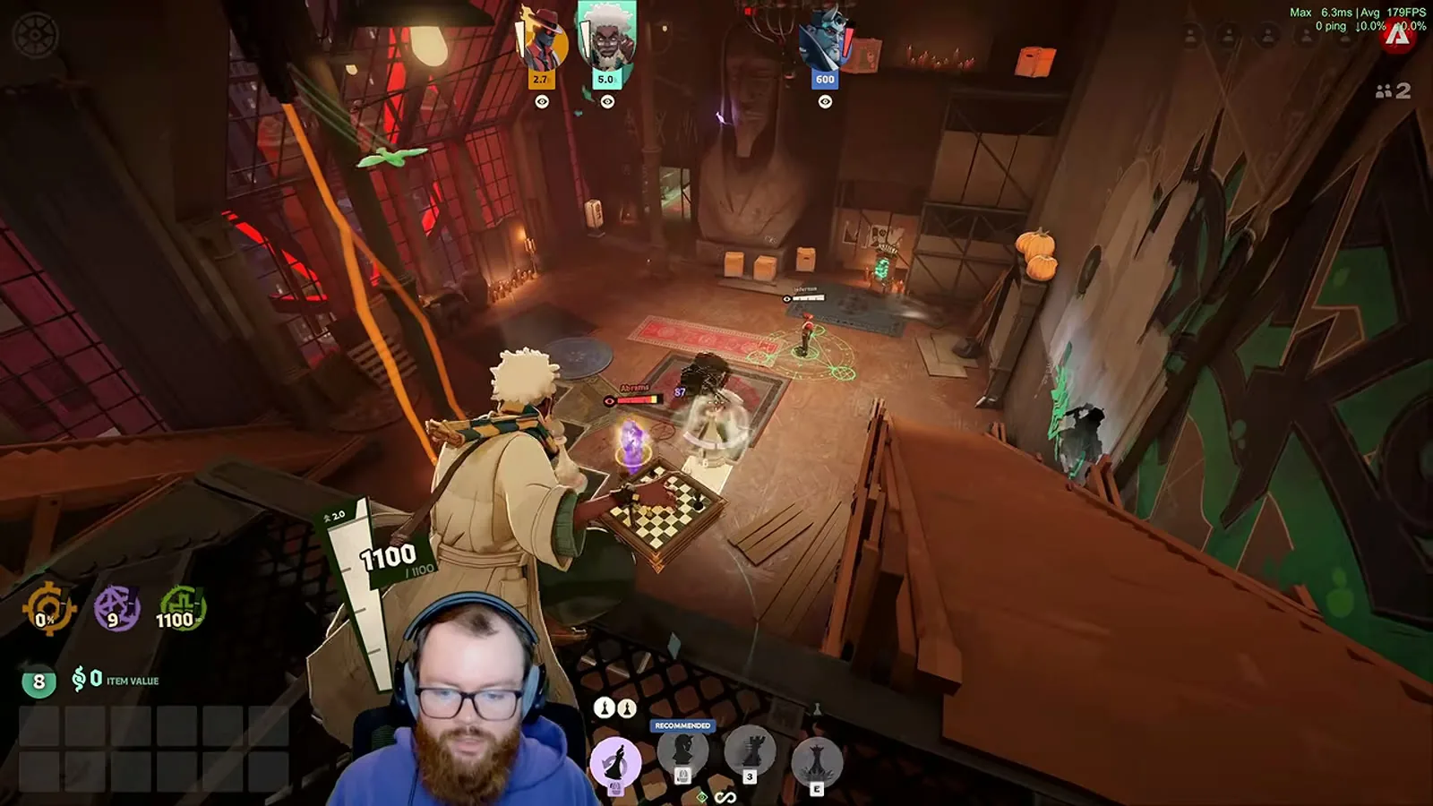 Solomon on a high ledge looking down into a room, moving his chess pieces from above