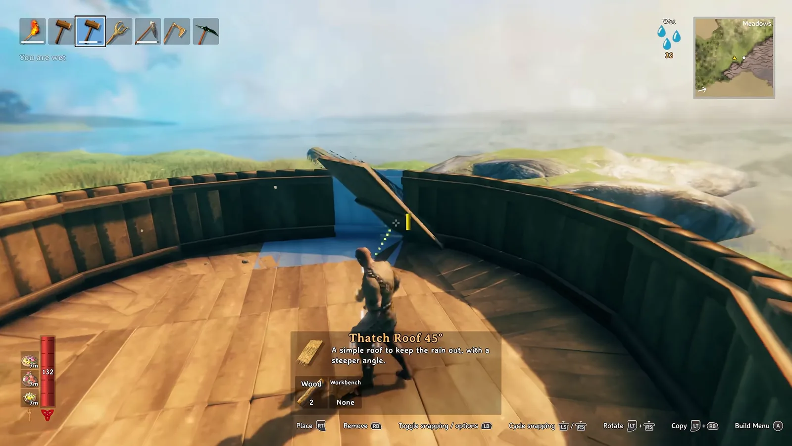 Valheim 1.0 hammer placing a Thatch Roof 45 piece with the snapping, copy and build menu prompts visible