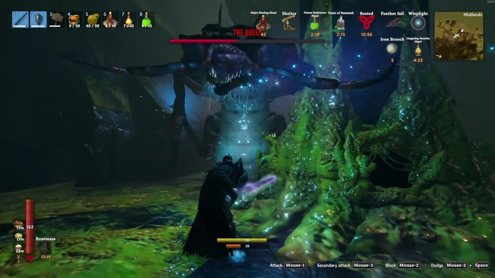 The Queen rearing up over the player during the Mistlands boss fight