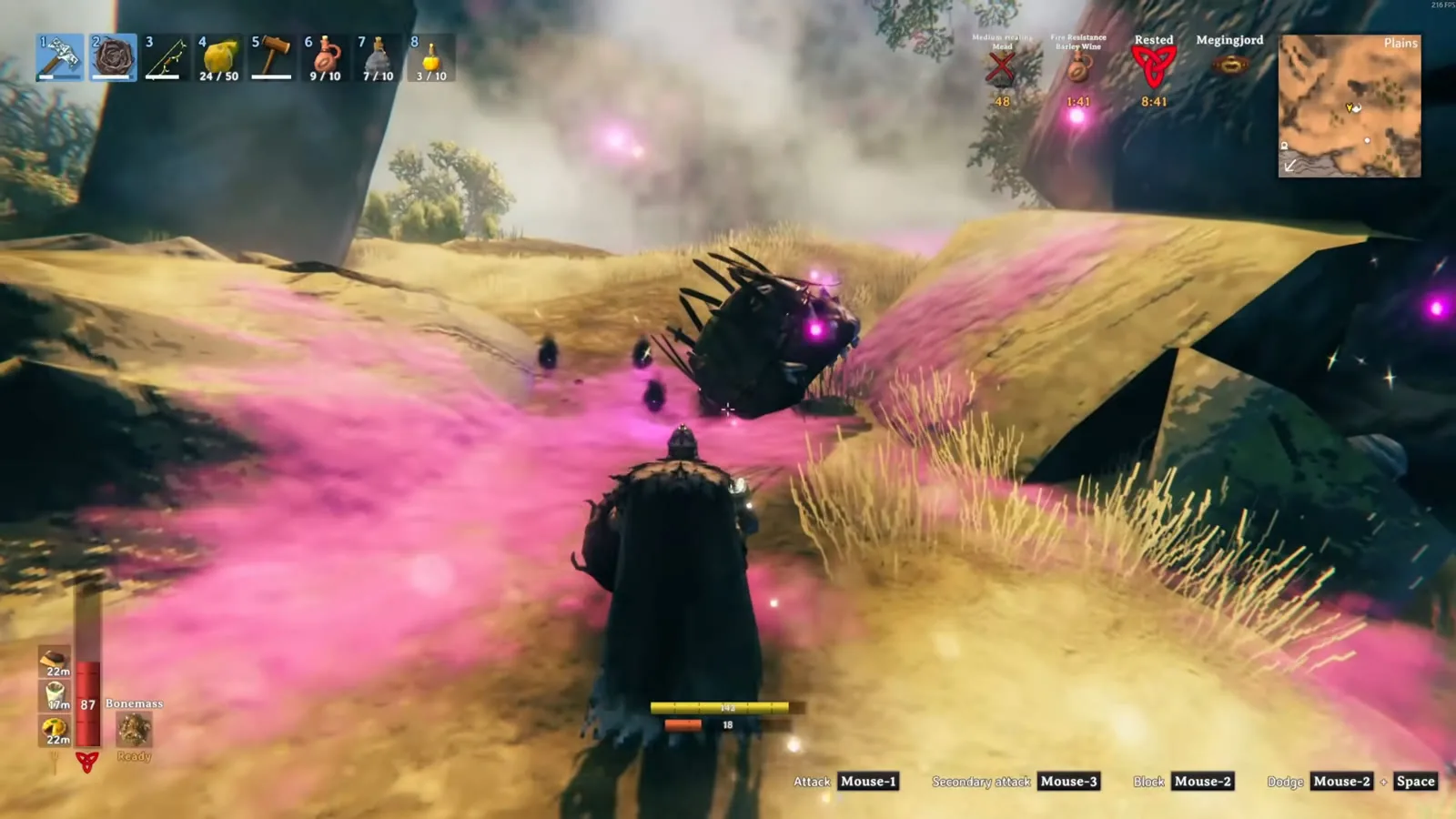 Yagluth's collapsed head lying in the grass after the kill, with Torn spirit drops nearby