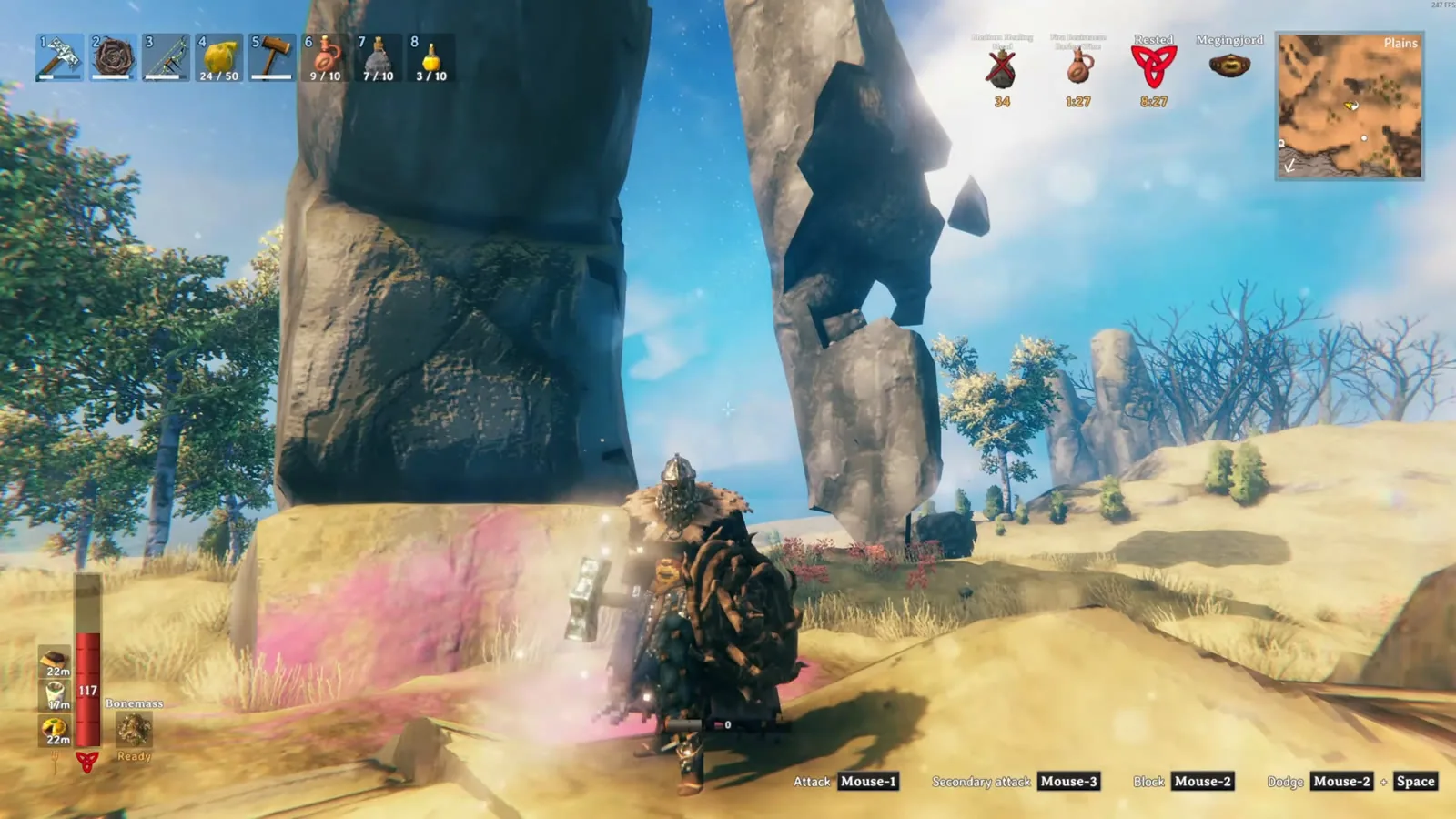 Viking in Padded armour standing between the huge stone pillars around Yagluth's altar in the Valheim Plains