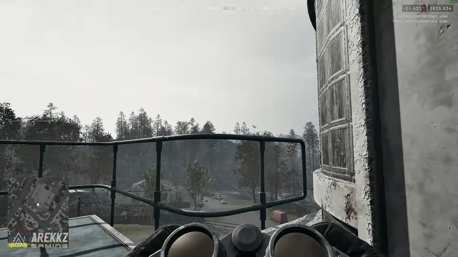WARDOGS binoculars raised on a rooftop to spot enemies for the team