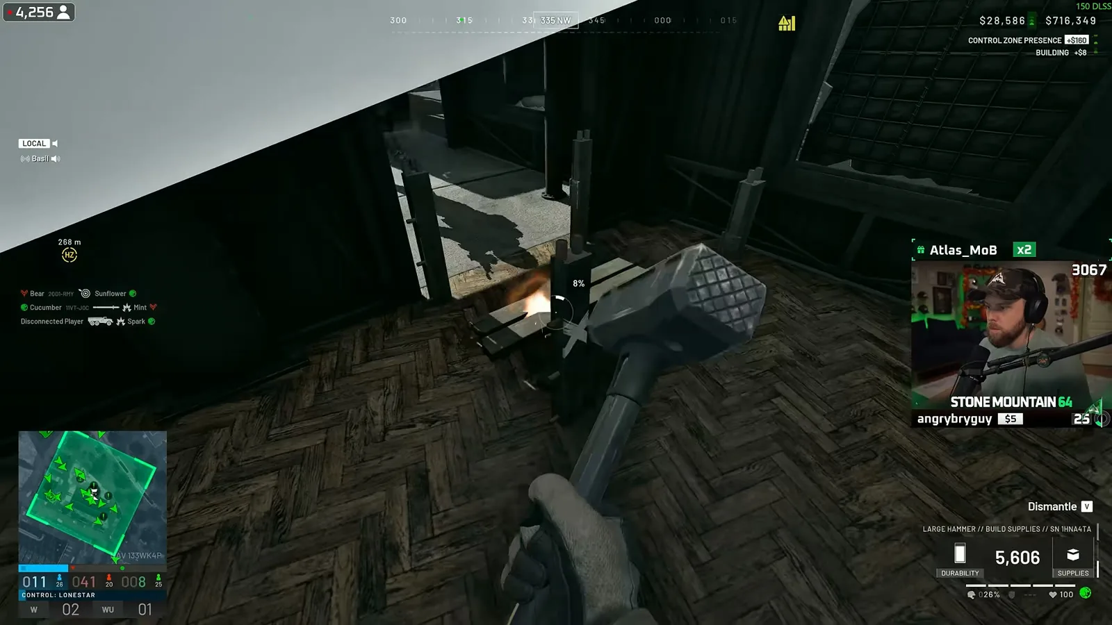 WARDOGS player swinging a build hammer at a FOB structure